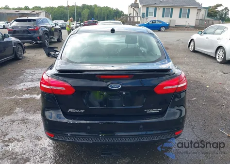 2016 Ford Focus Titanium z USA, uszkodzony, nr VIN 1FADP3J27GL215436